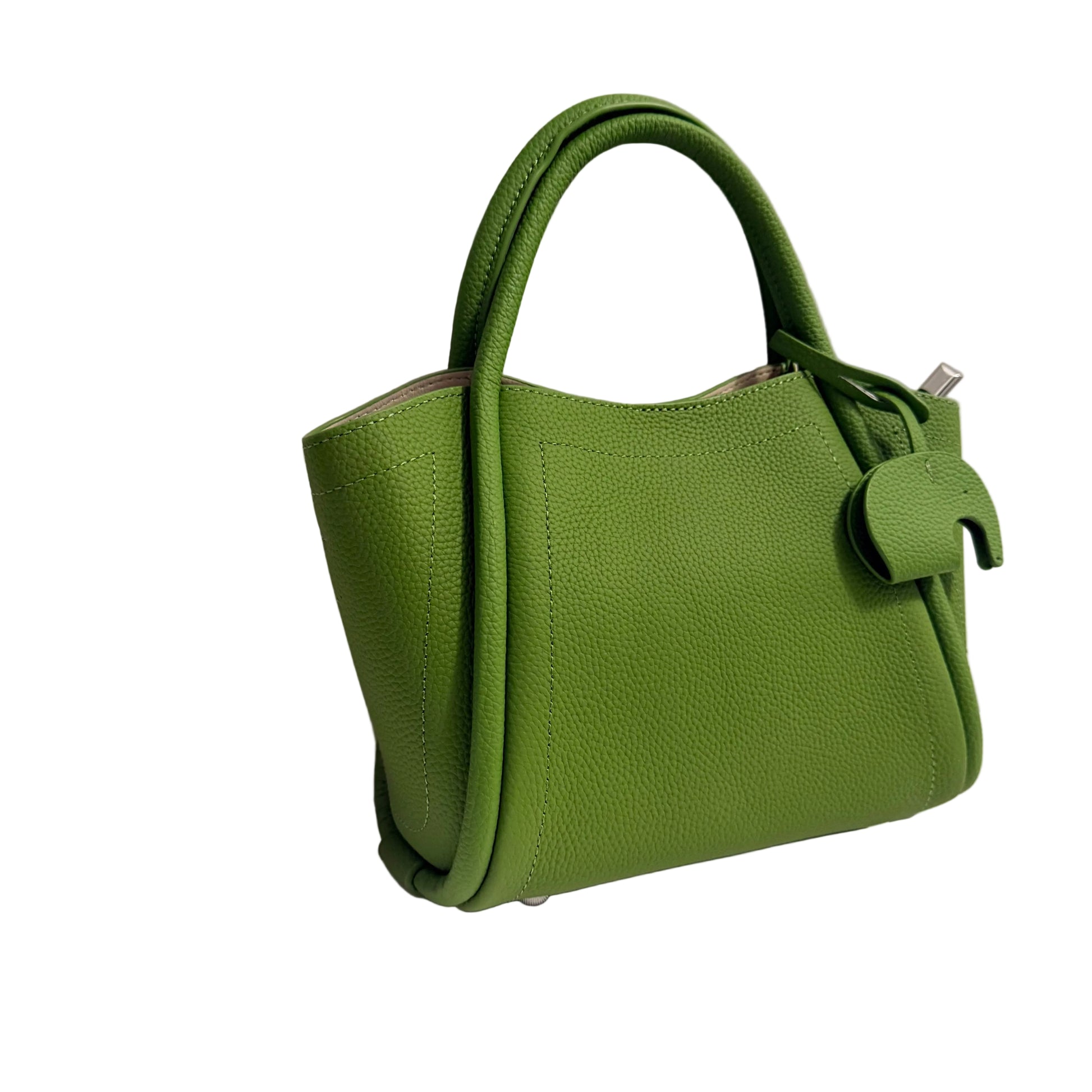 Green handbag on a light gray background