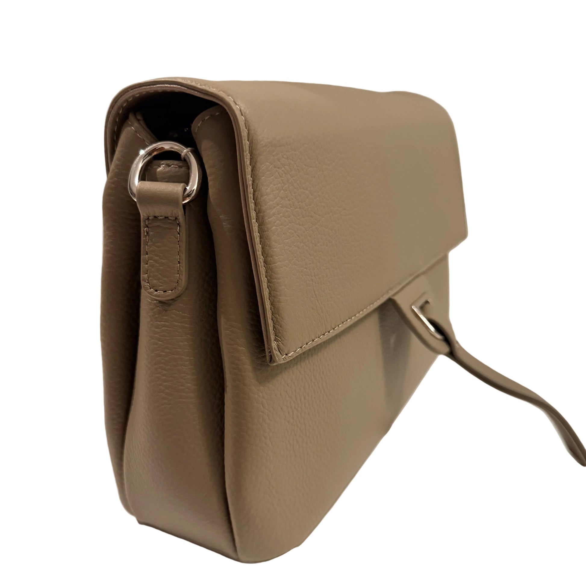 Beige handbag with a strap on a light background