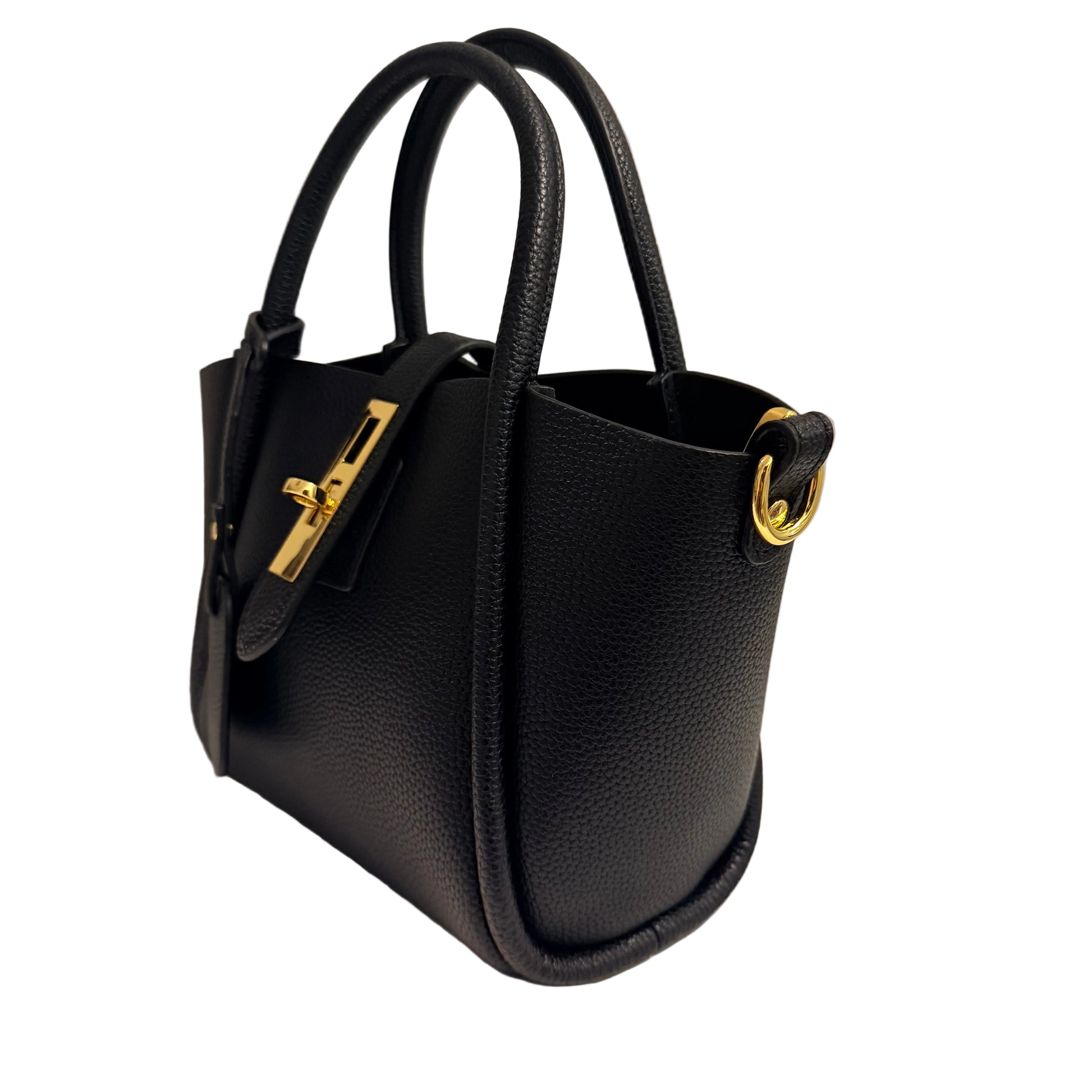 Black handbag with gold hardware on a light background