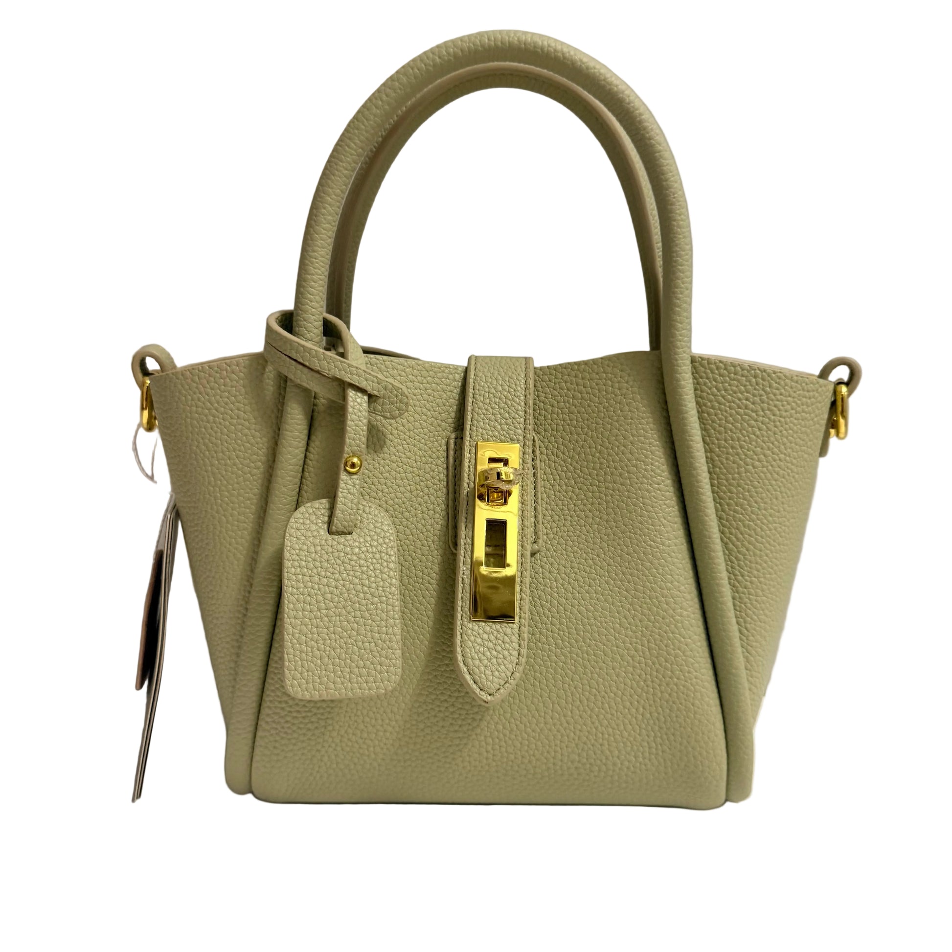 Green handbag with gold accents on a gray background