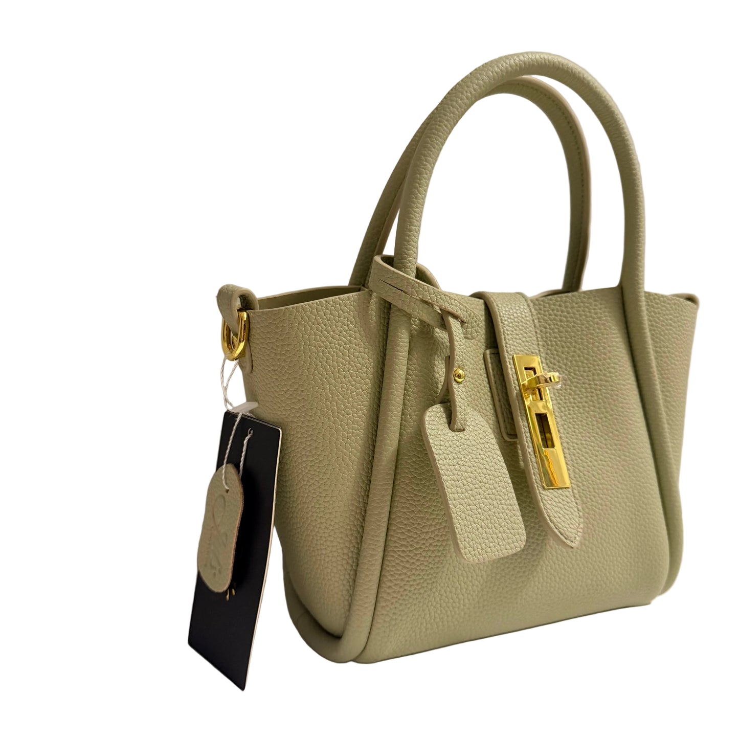 Light green handbag with gold accents on a white surface