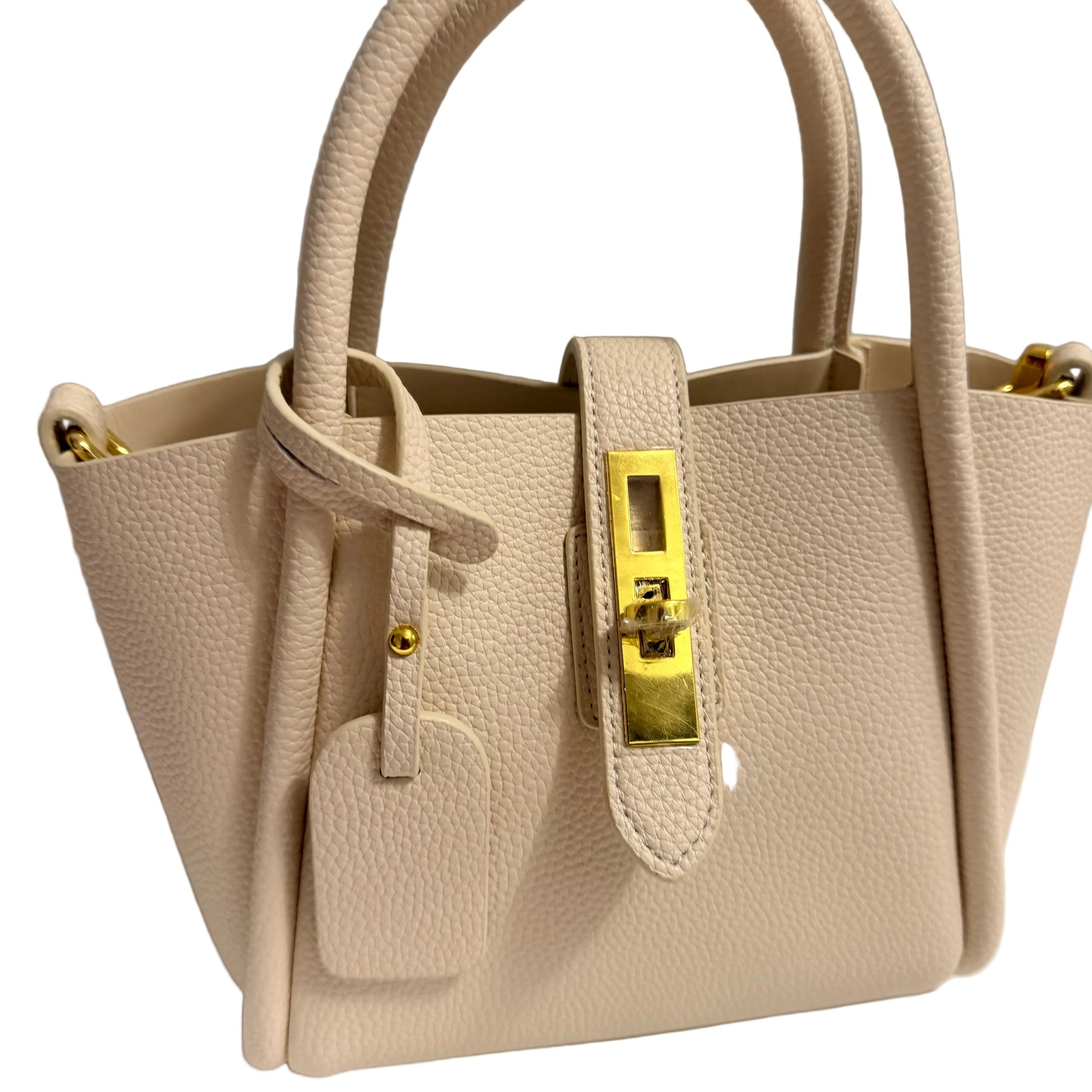 Beige handbag with a gold clasp on a neutral background