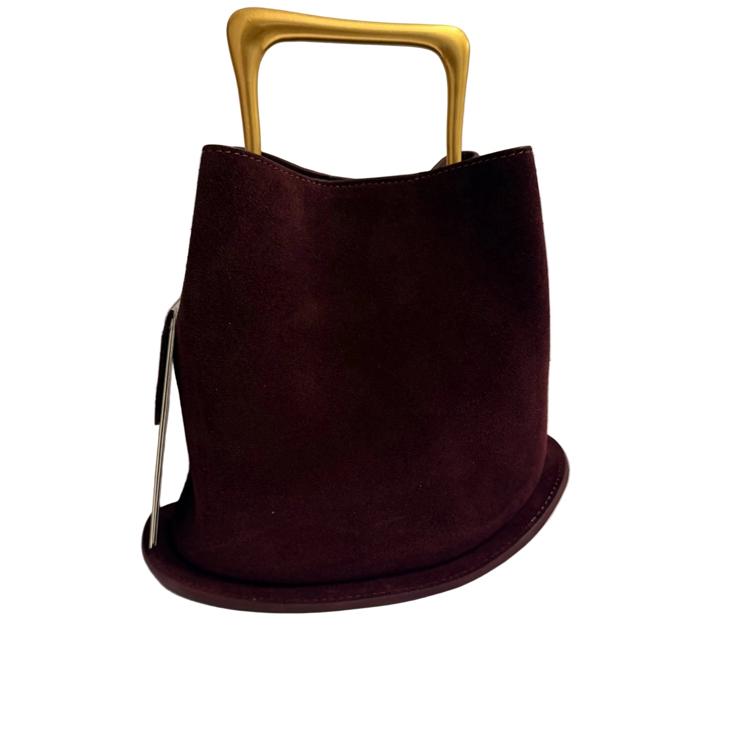 Brown handbag with a gold handle on a white surface