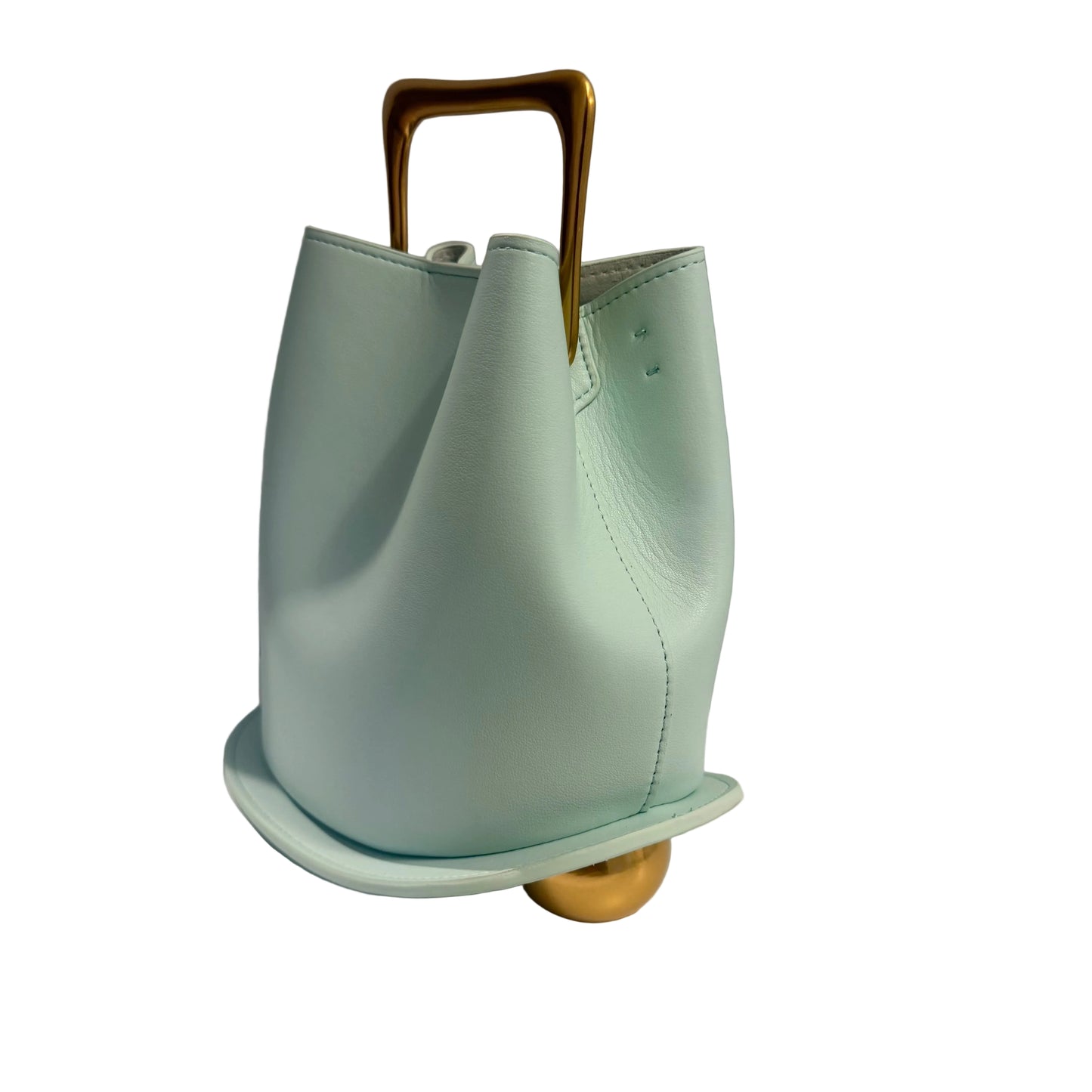 Light blue leather bag with gold accents on a white surface