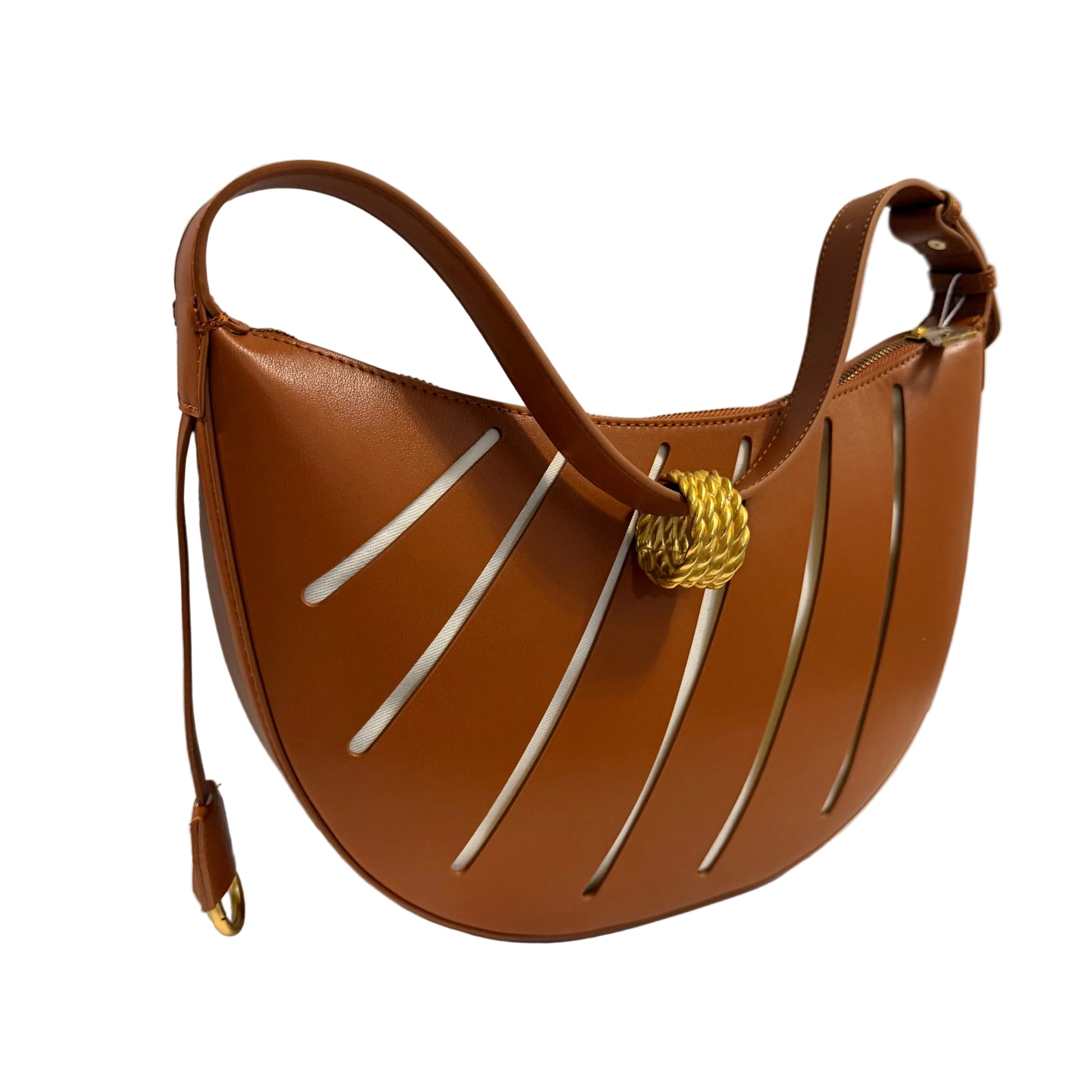 Brown leather handbag with gold accents on a white surface
