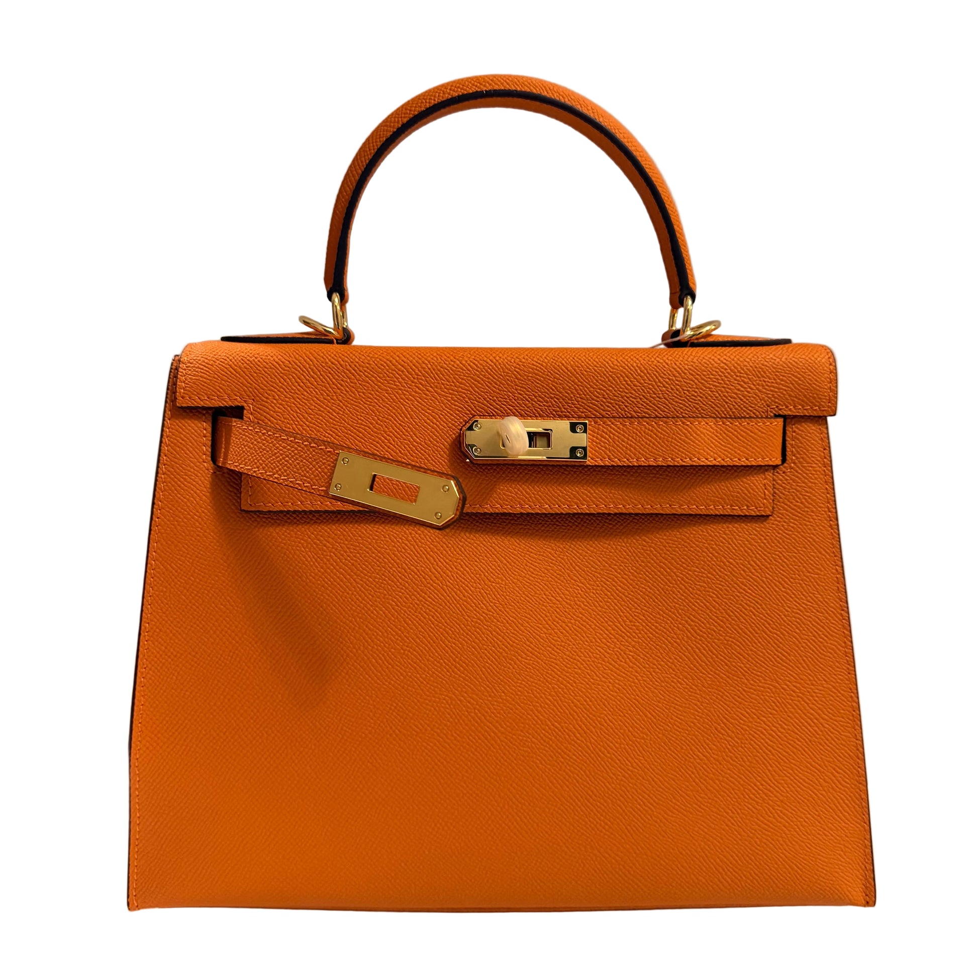 Orange handbag with gold hardware on a neutral background
