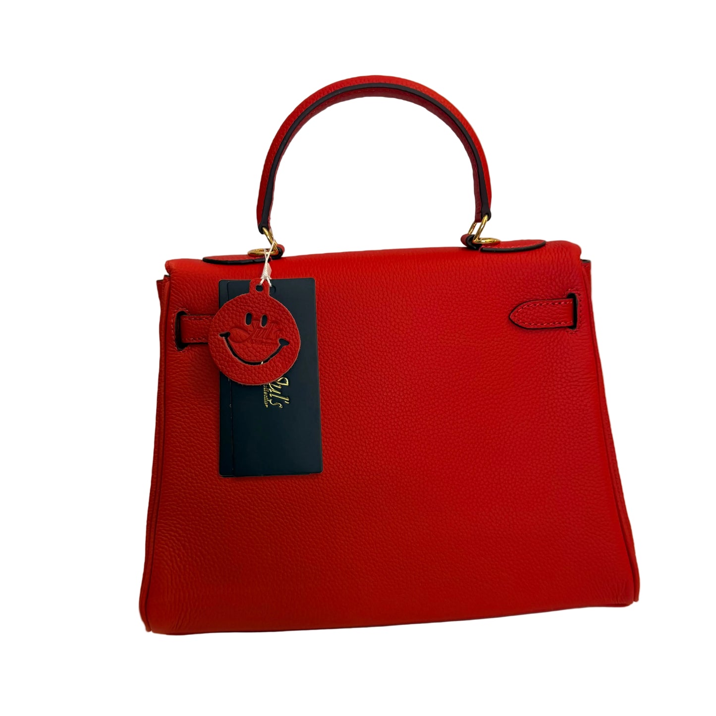 Red handbag with a smiley face tag on a light gray background