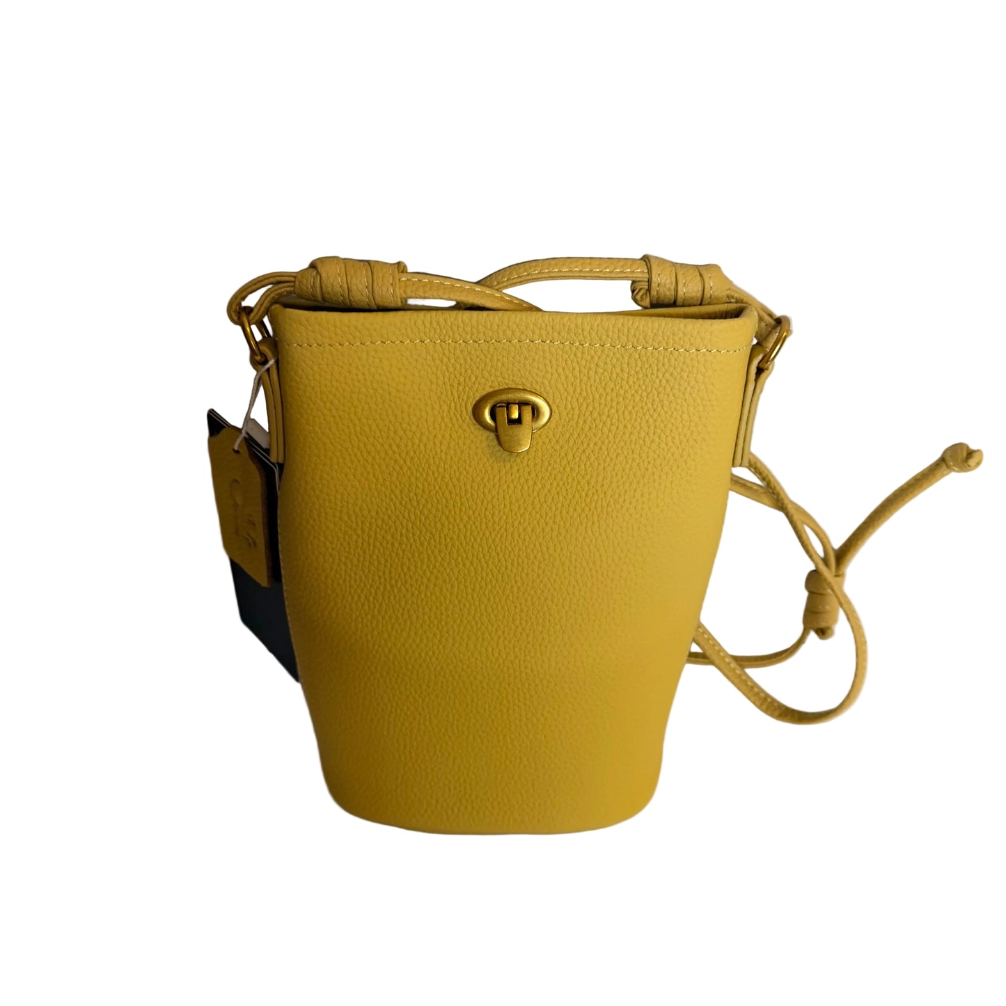Yellow handbag with a strap on a light background
