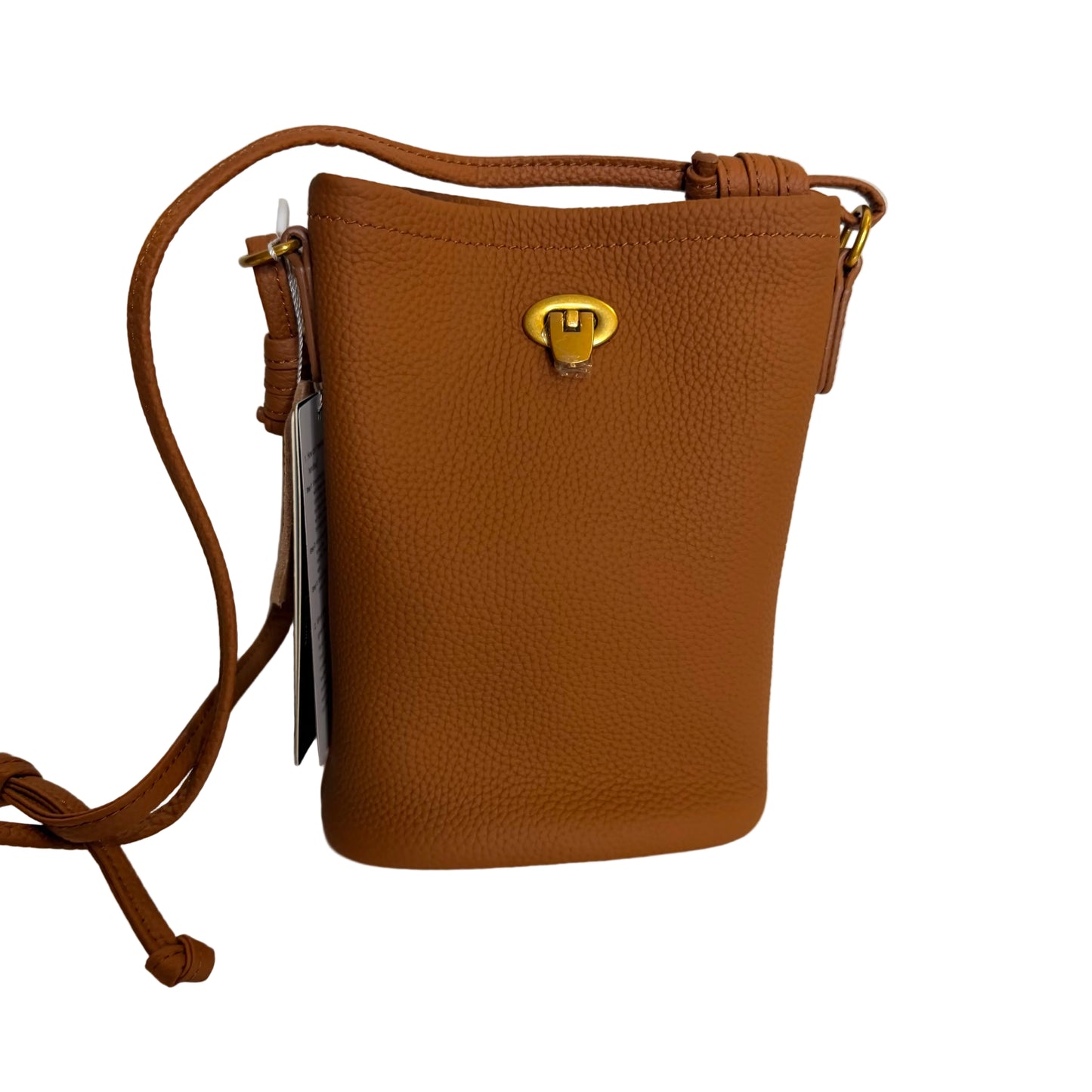 Brown leather handbag with a gold clasp on a light surface.