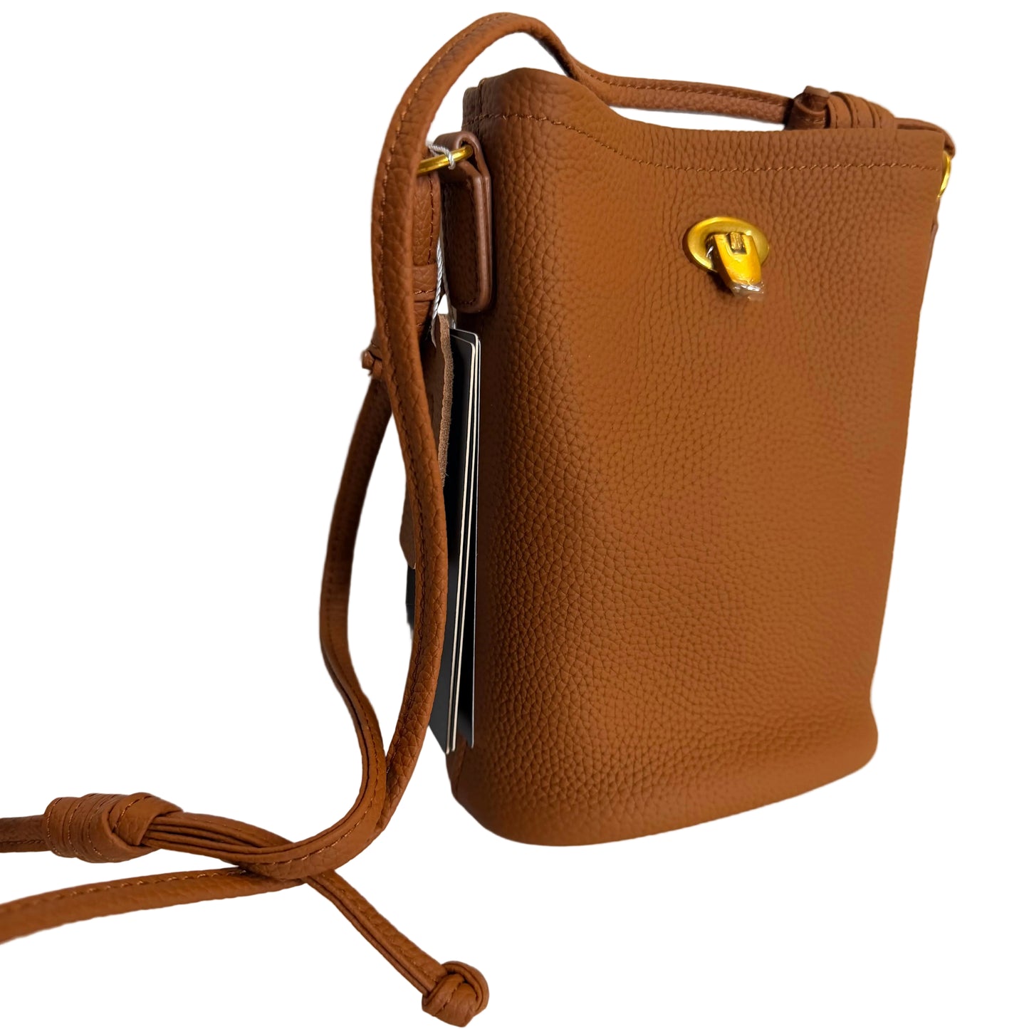 Brown leather handbag with a yellow clasp on a light background