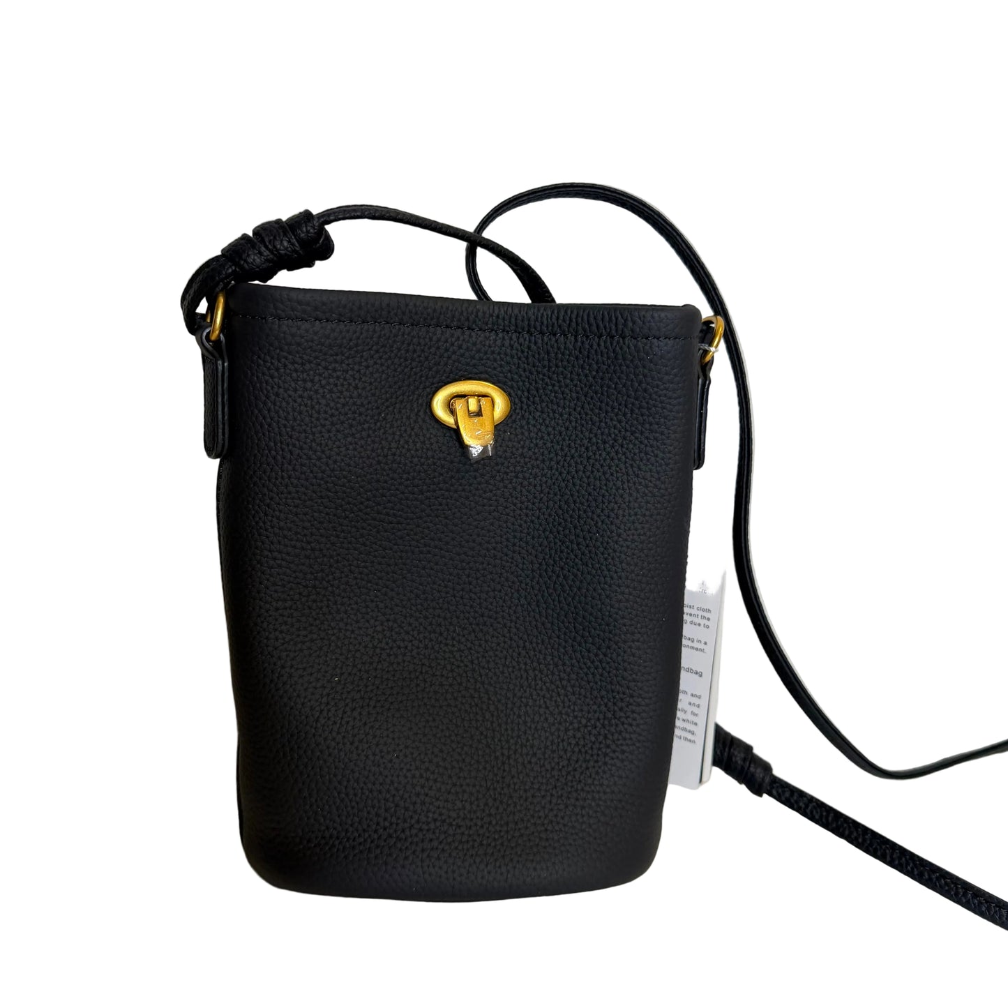 Black leather crossbody bag with a gold emblem on a white background