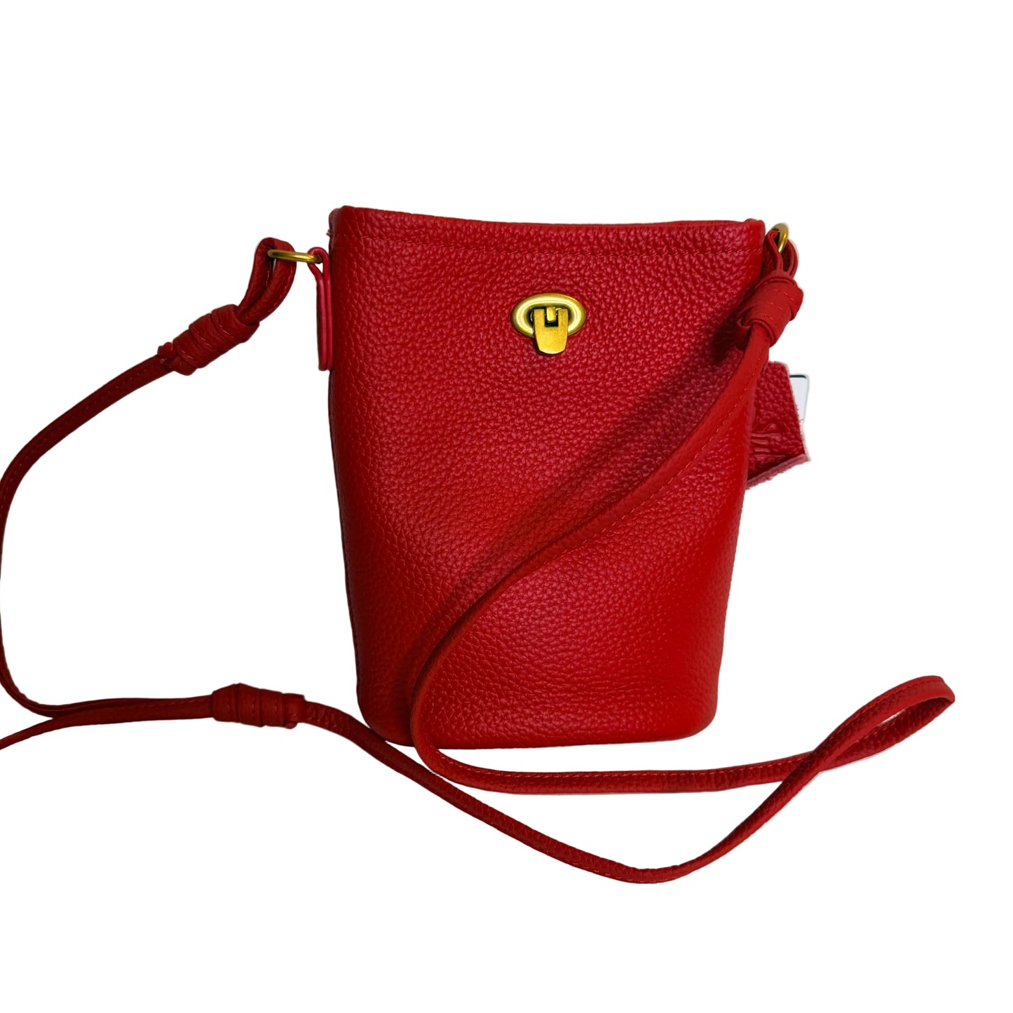 Red leather crossbody bag with a gold clasp on a light background