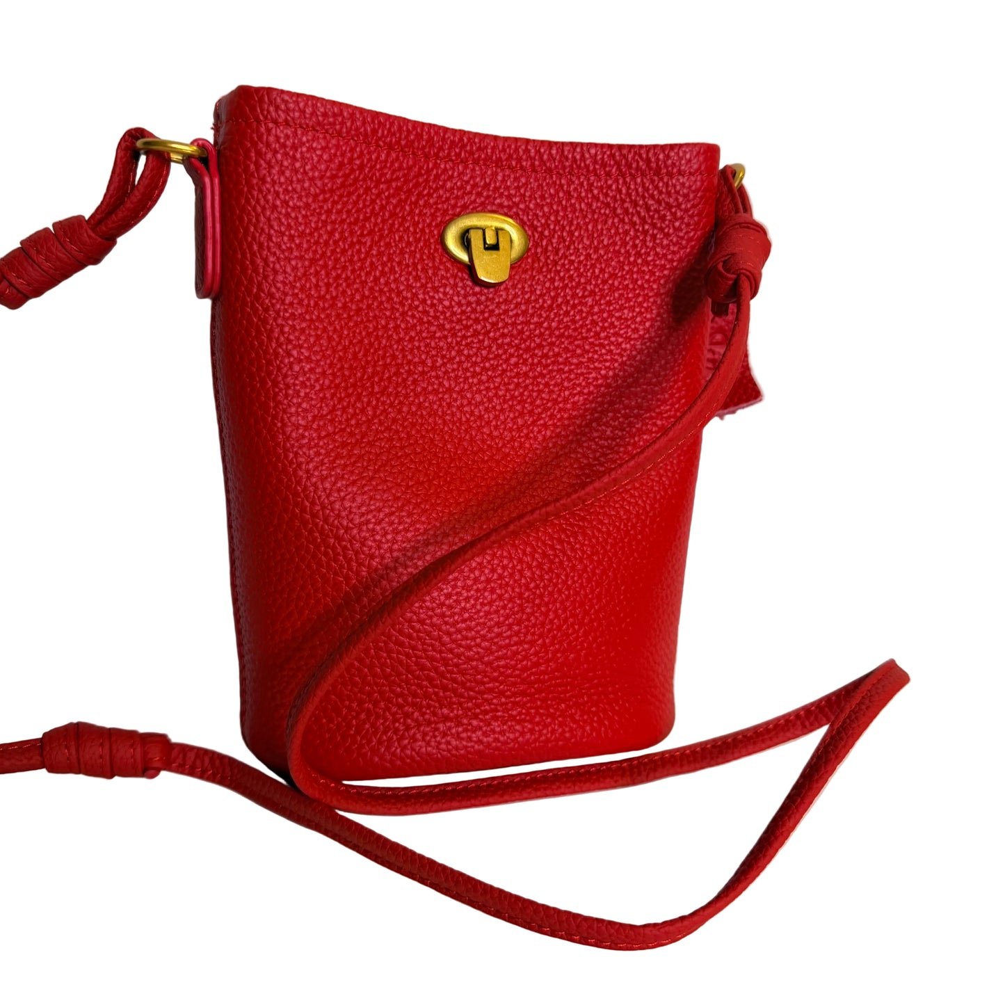Red leather handbag with a gold clasp on a white background