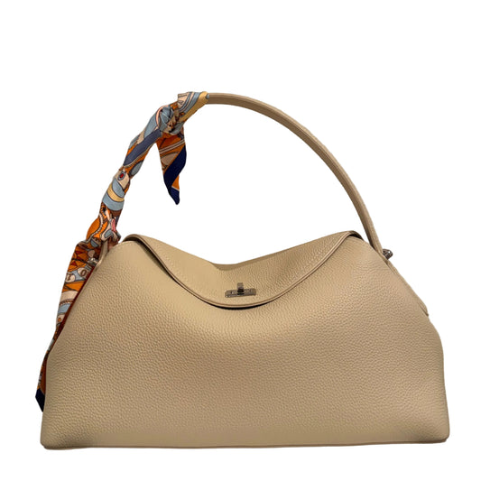 Beige handbag with a patterned strap on a neutral background