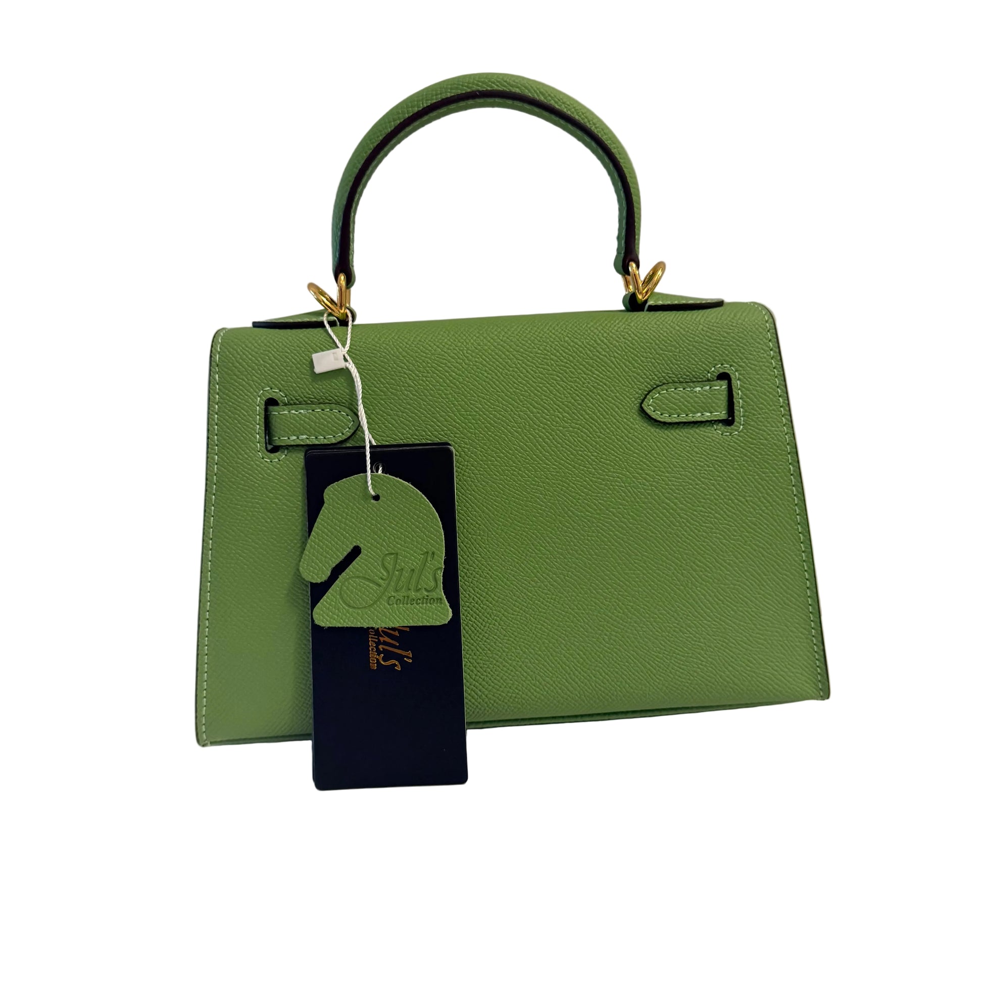 Green handbag with a tag on a neutral background