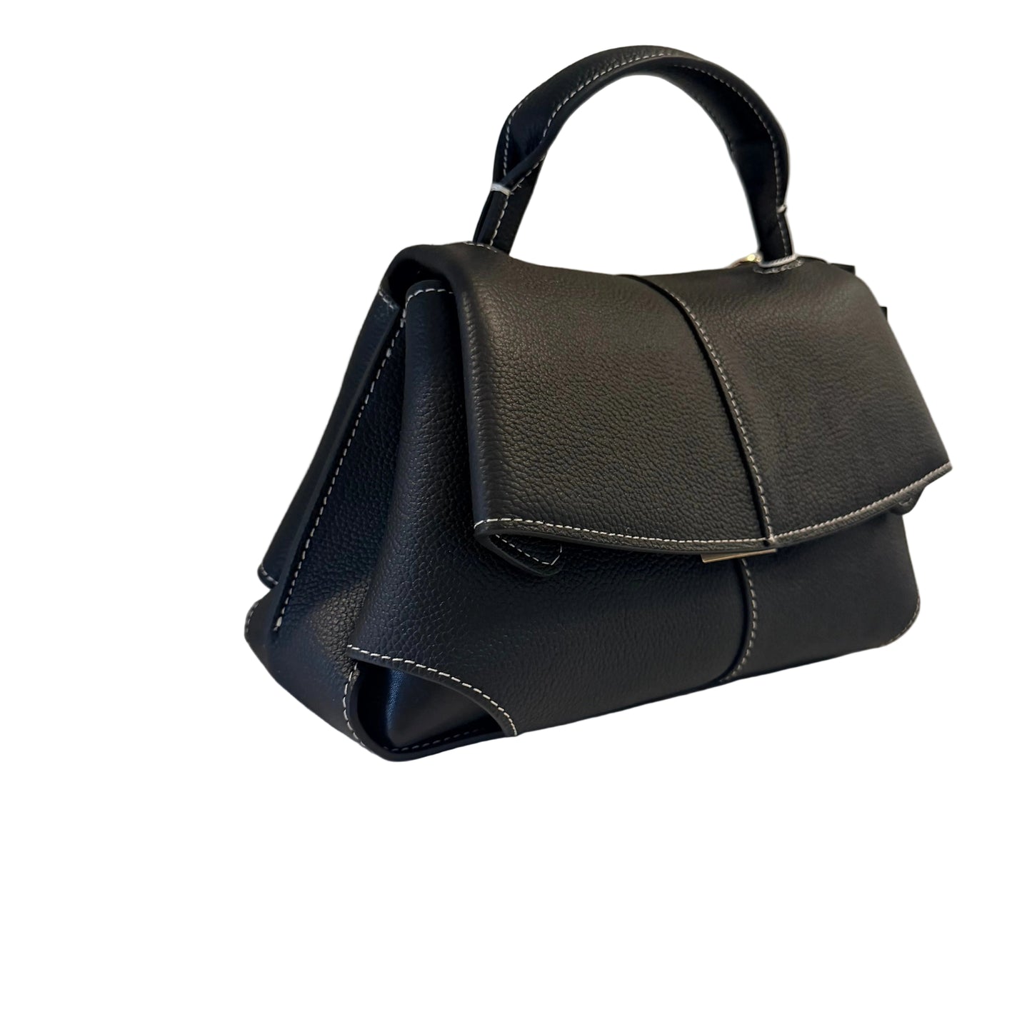 Black handbag on a light surface with a neutral background
