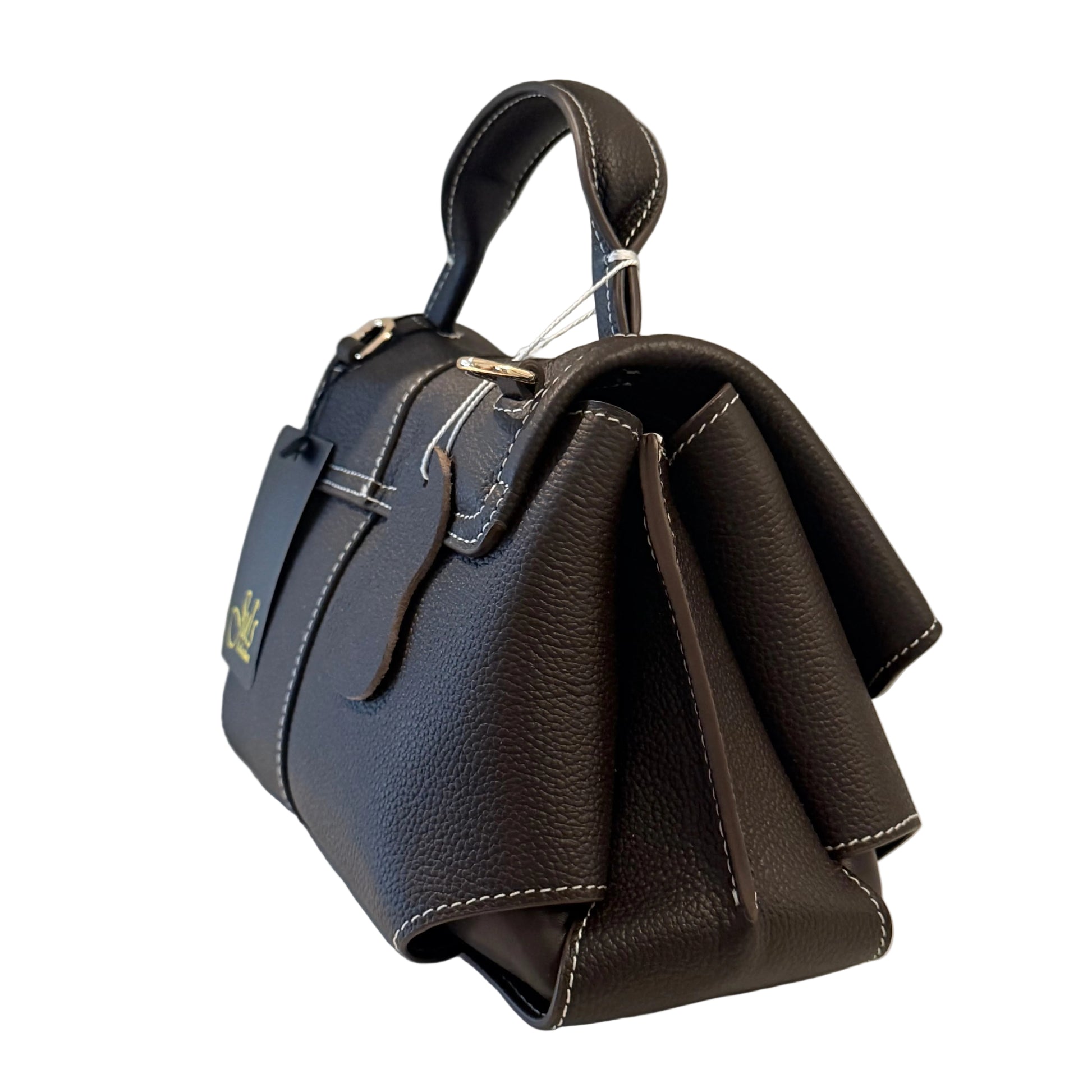 Black handbag with a unique design on a white surface