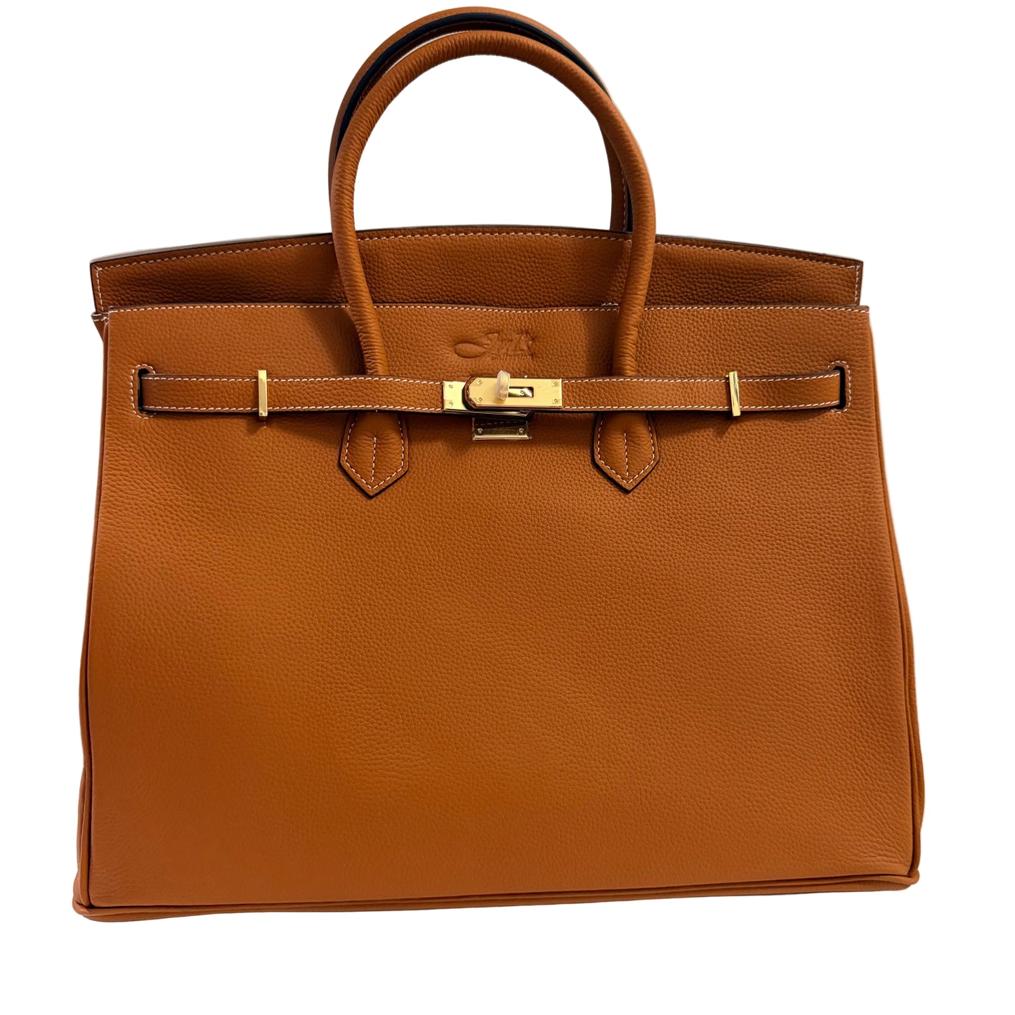 Brown leather handbag with gold hardware on a light gray background