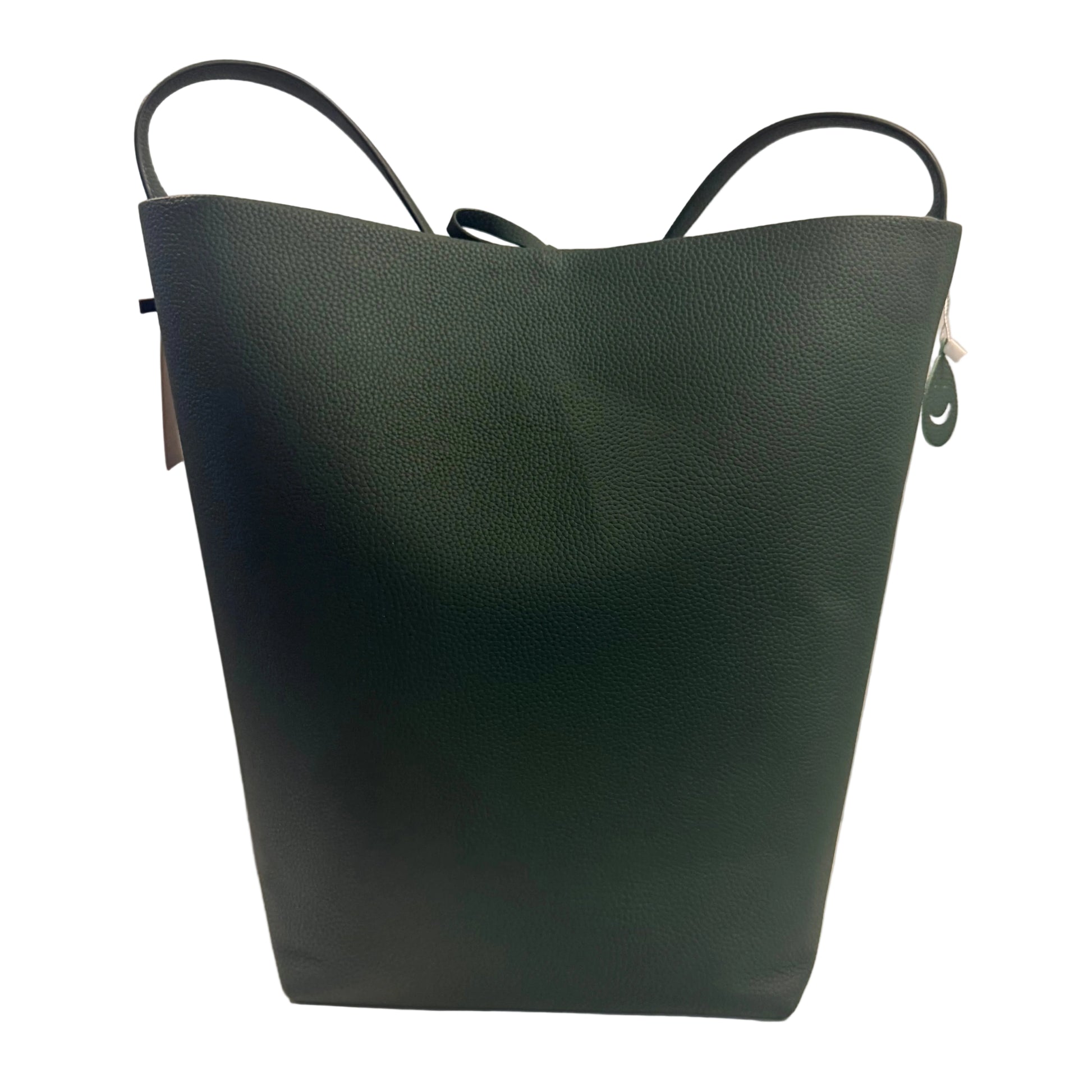 Green leather handbag on a white surface with a neutral background
