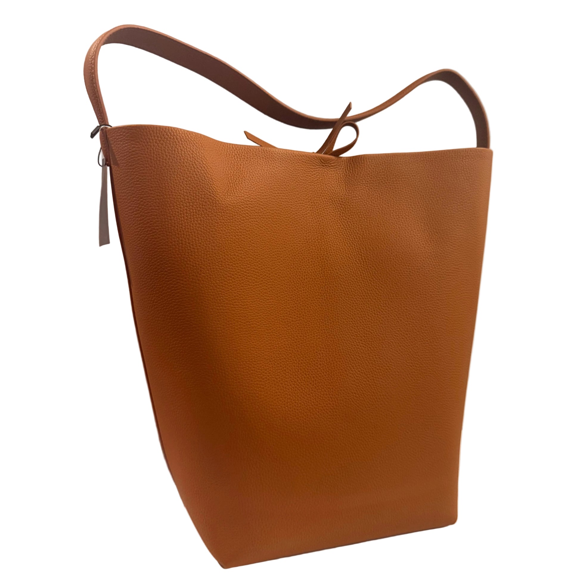 Brown leather tote bag on a light gray background