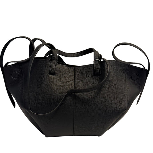A black pebbled leather tote bag with multiple shoulder straps, displayed on a white surface against a light gray background.