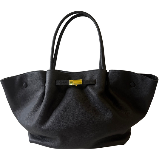 Black handbag with a gold clasp on a white background